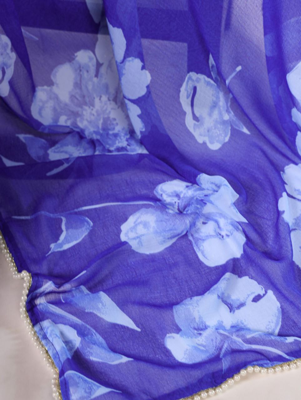 Delicate blooms & pearl border dreams saree